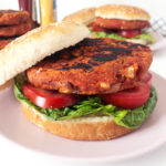 Classic Chickpea Veggie Burgers with lettuce, tomato, and a sesame seed bun