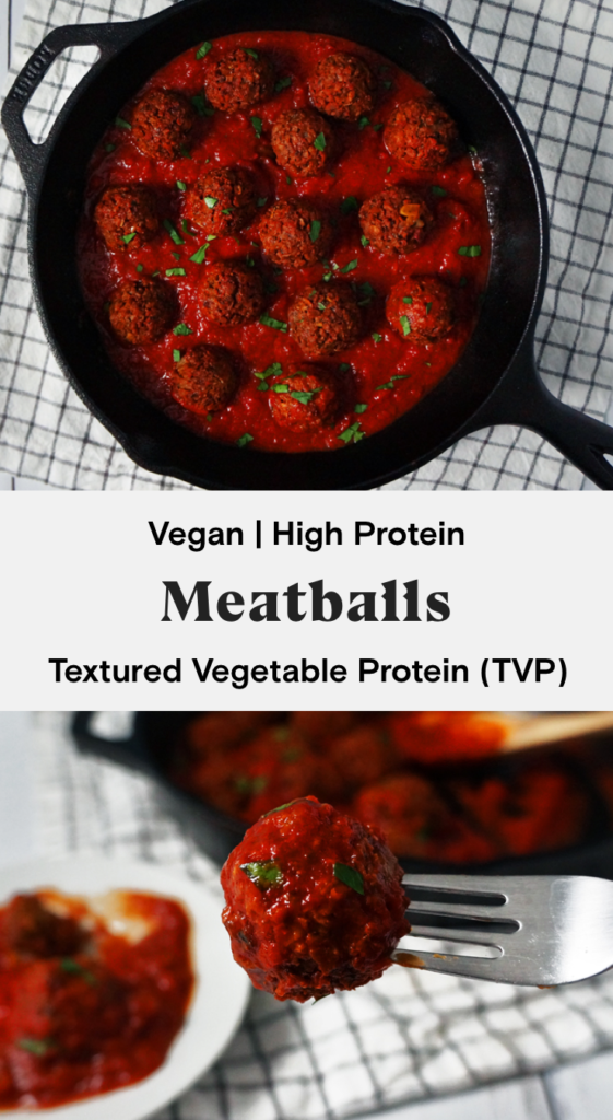 Vegan high-protein textured vegetable protein (TVP) meatballs in a cast iron skillet full of tomato sauce and topped with chopped parsley.