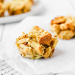 Delicious crispy stuffing muffins on a cooling rack.
