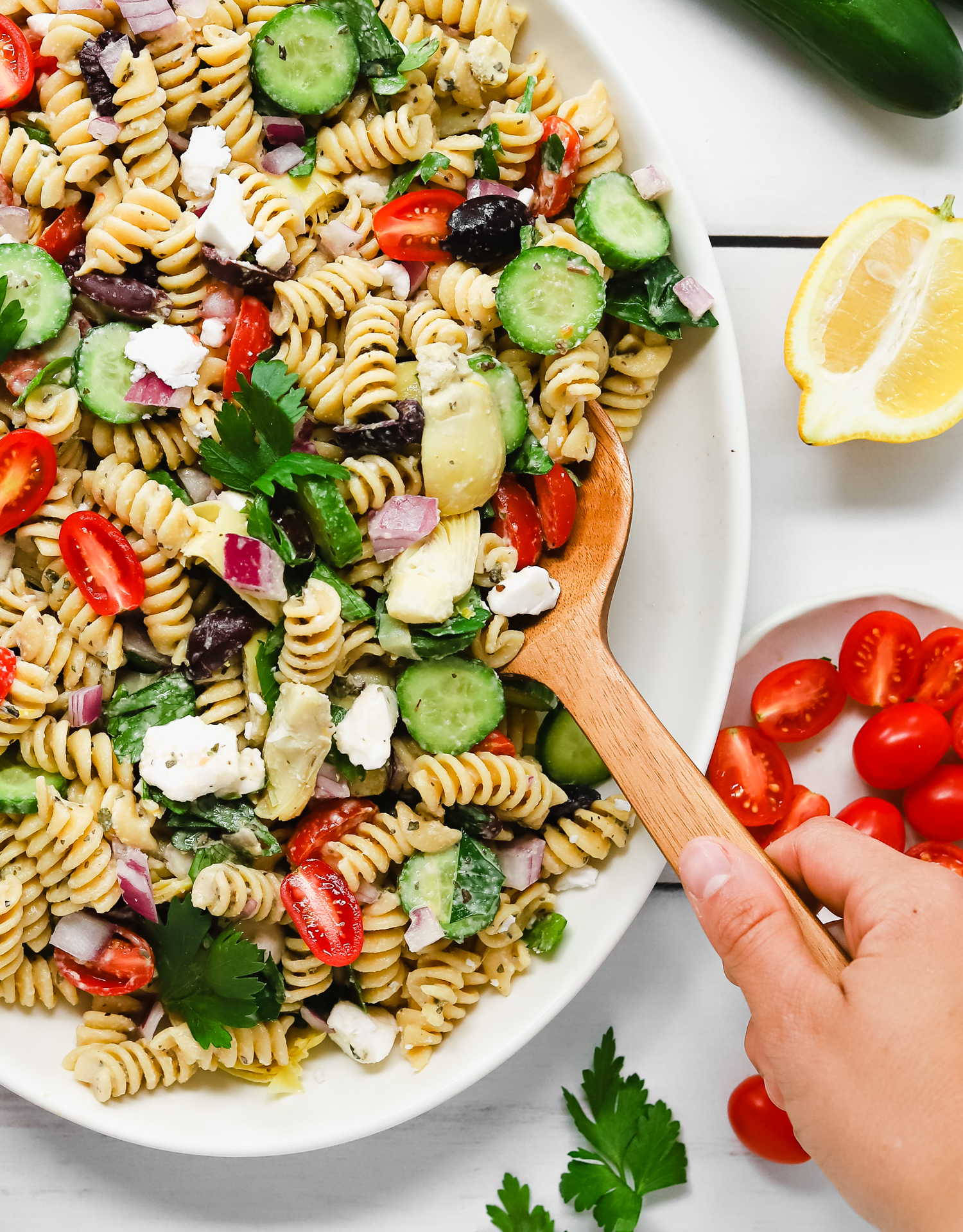 Healthy vegan greek pasta salad on a large white plate